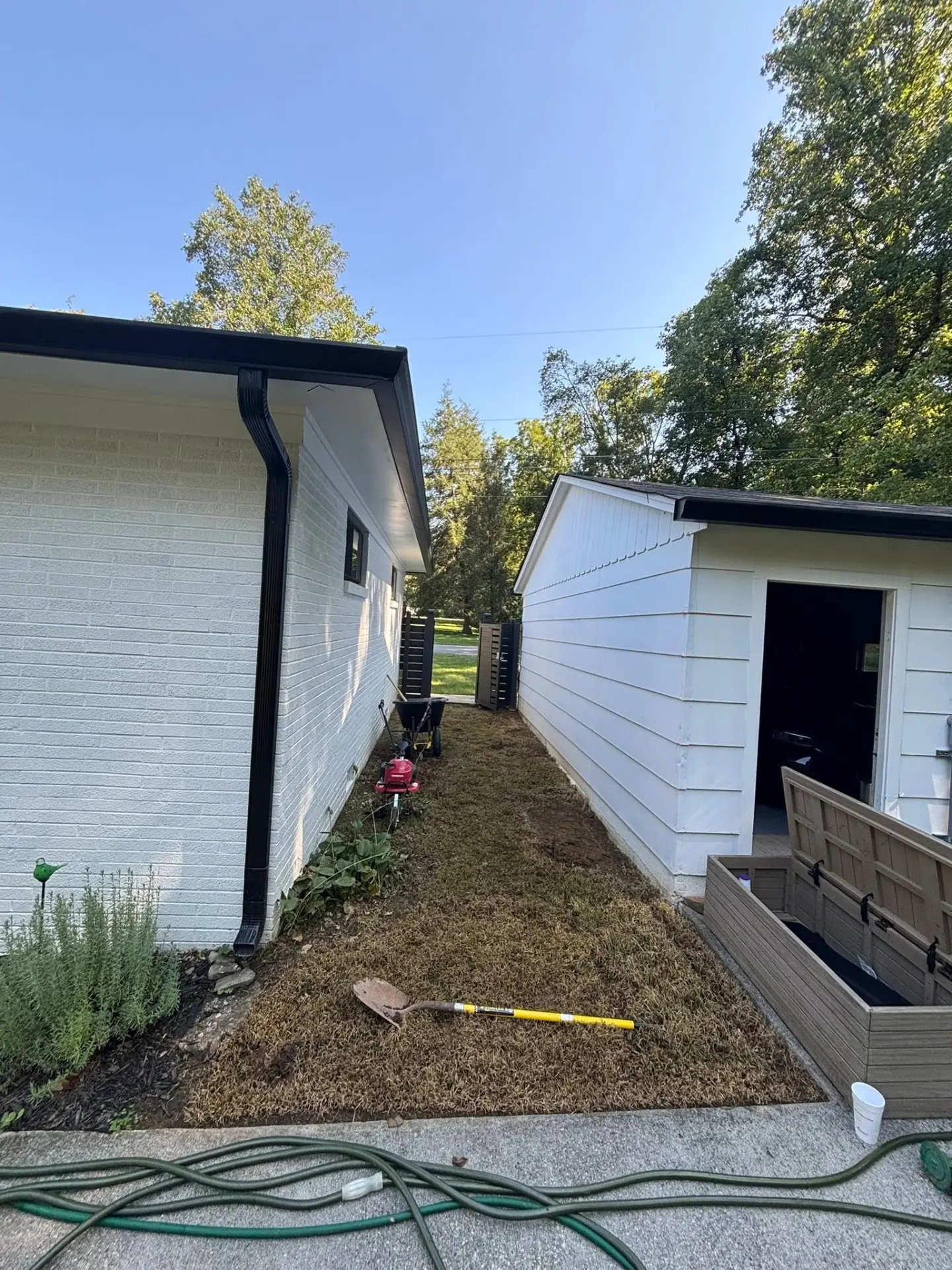 Side yard graded and prepped for a new gravel walkway